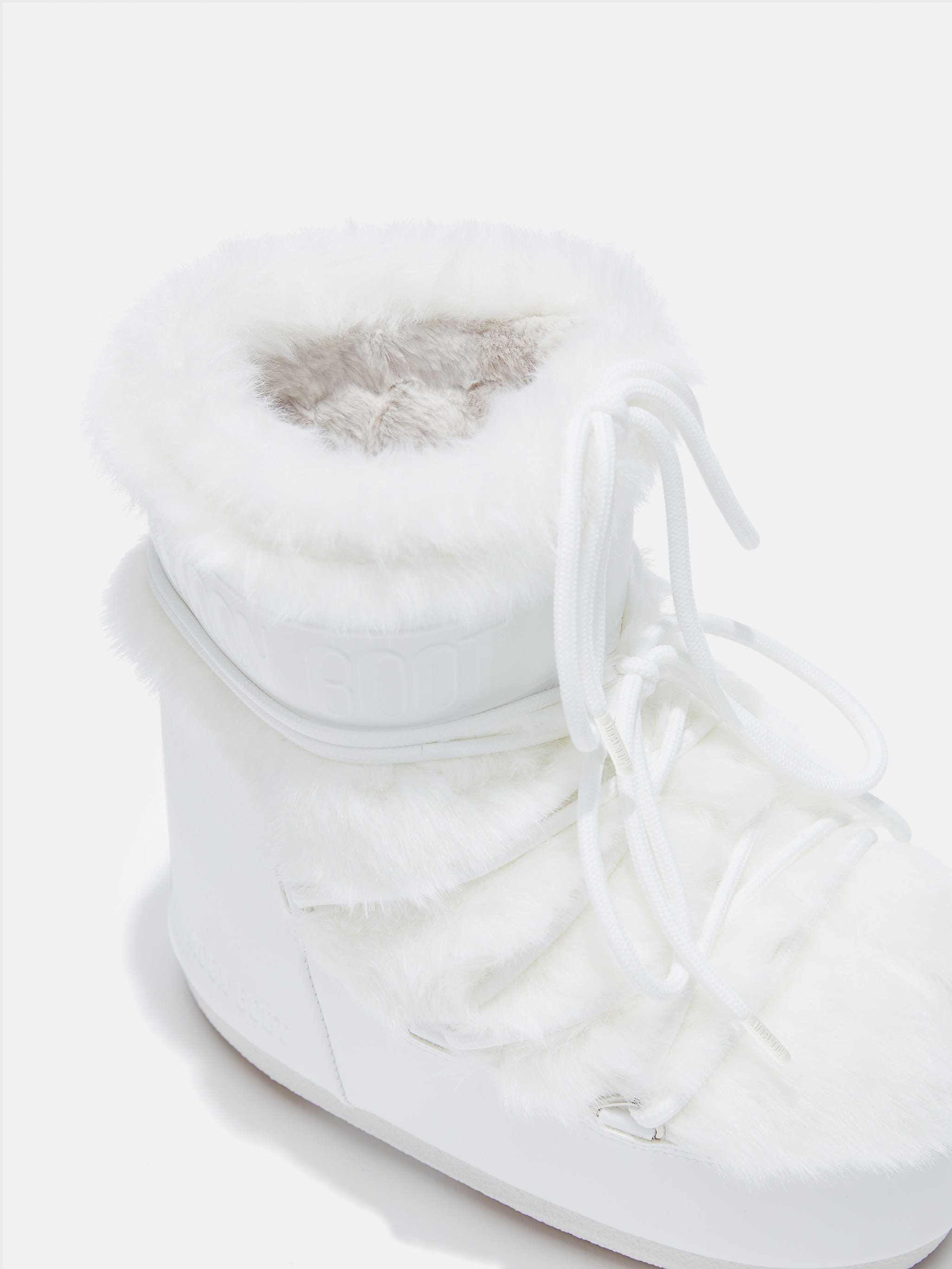 ショートブーツ・ブーティ MOON BOOT 'Icon Low Faux-Fur Beads' boots White ICON LOW WHITE FAUX-FUR BOOTS | Moon Boot®